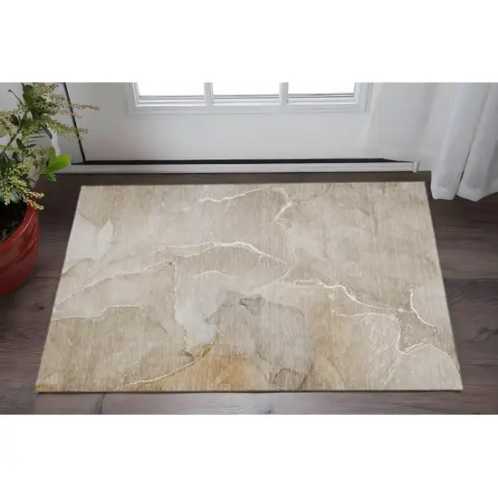 Beige And Ivory Abstract Washable Area Rug With UV Protection Photo 2