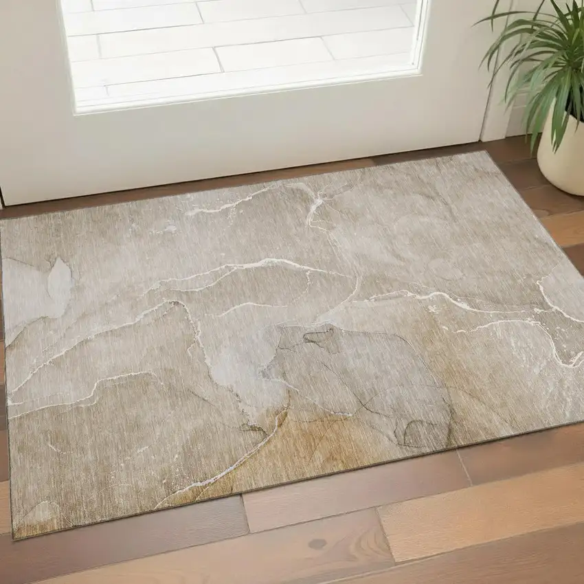 Beige And Ivory Abstract Washable Area Rug With UV Protection Photo 1