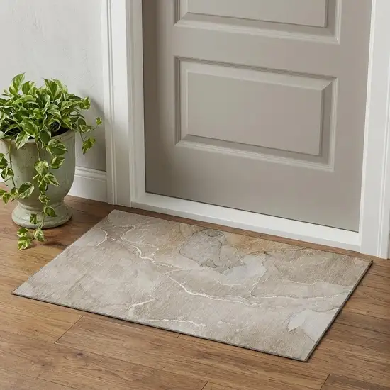 Beige And Ivory Abstract Washable Area Rug With UV Protection Photo 1