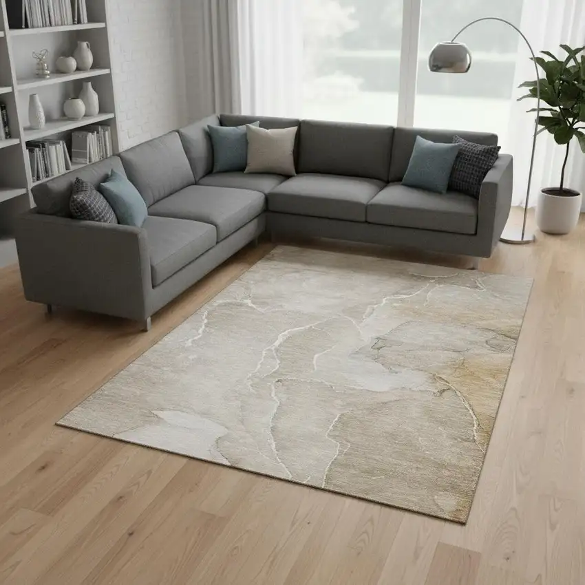 Beige And Ivory Abstract Washable Area Rug With UV Protection Photo 1