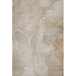 Photo of Beige And Ivory Abstract Washable Area Rug With UV Protection