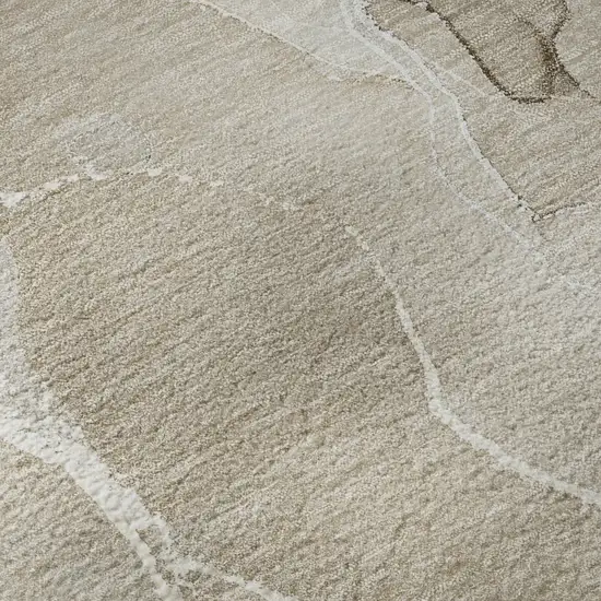 Beige And Ivory Abstract Washable Area Rug With UV Protection Photo 3
