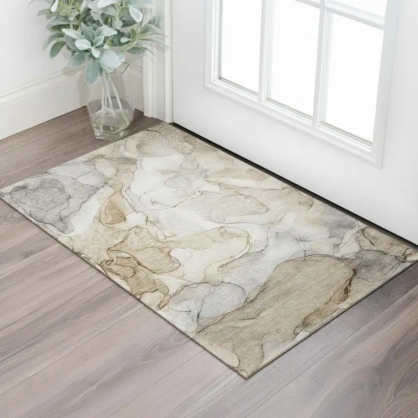 Beige And Ivory Abstract Washable Area Rug With UV Protection Photo 1