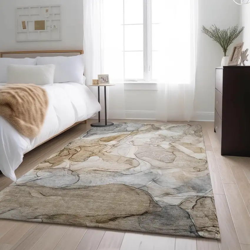 Beige And Ivory Abstract Washable Area Rug With UV Protection Photo 4
