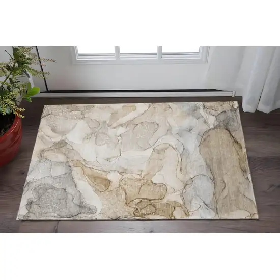Beige And Ivory Abstract Washable Area Rug With UV Protection Photo 2