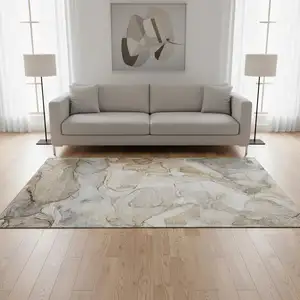 Photo of Beige And Ivory Abstract Washable Area Rug With UV Protection