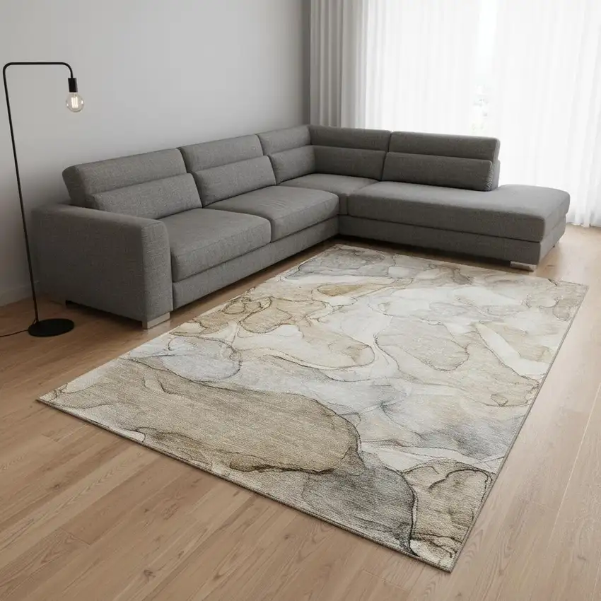 Beige And Ivory Abstract Washable Area Rug With UV Protection Photo 1