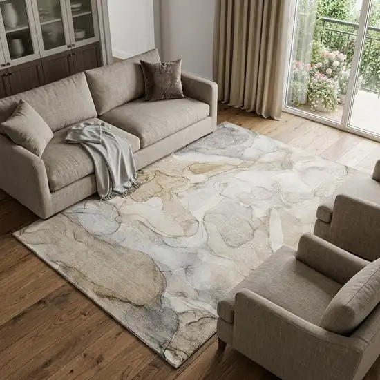 Beige And Ivory Abstract Washable Area Rug With UV Protection Photo 1