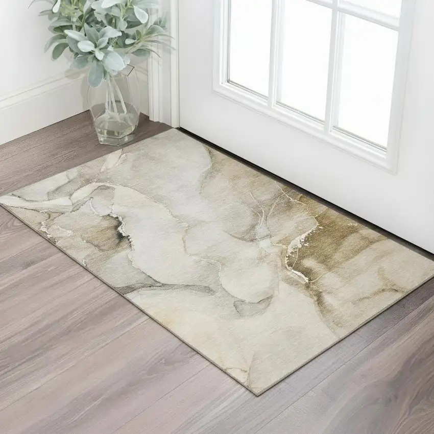 Beige And Ivory Abstract Washable Area Rug With UV Protection Photo 1