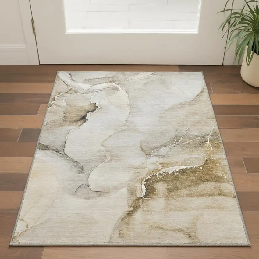Beige And Ivory Abstract Washable Area Rug With UV Protection Photo 2