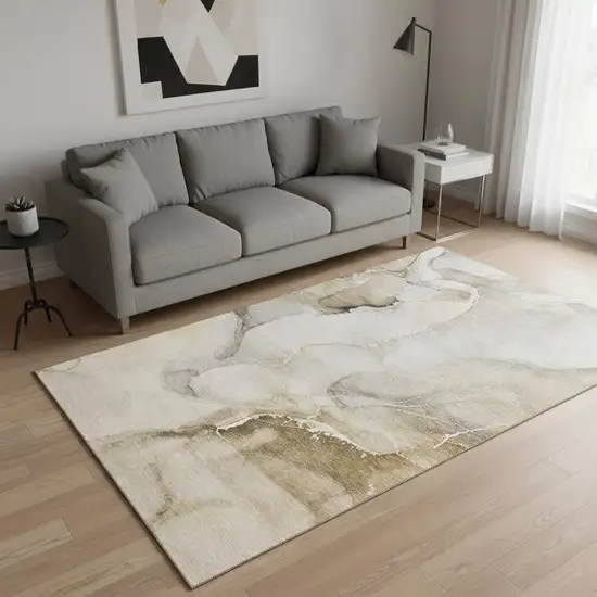 Beige And Ivory Abstract Washable Area Rug With UV Protection Photo 2