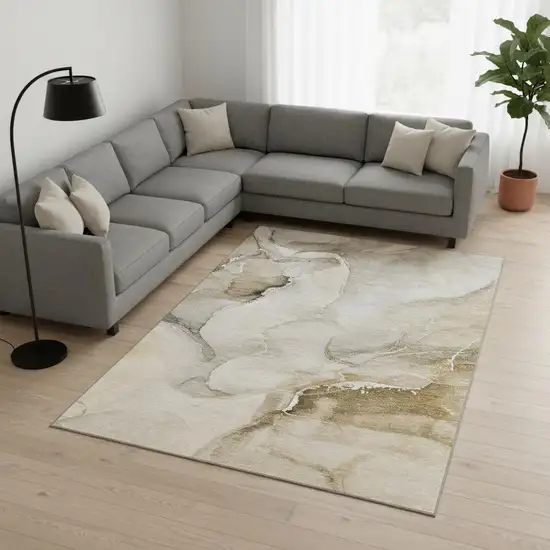 Beige And Ivory Abstract Washable Area Rug With UV Protection Photo 1