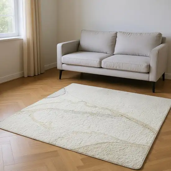 Beige And Ivory Abstract Washable Area Rug With UV Protection Photo 2