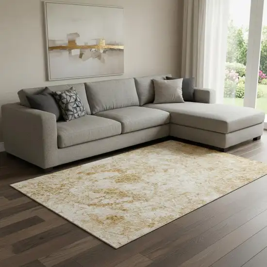 Beige And Ivory Abstract Washable Area Rug With UV Protection Photo 1