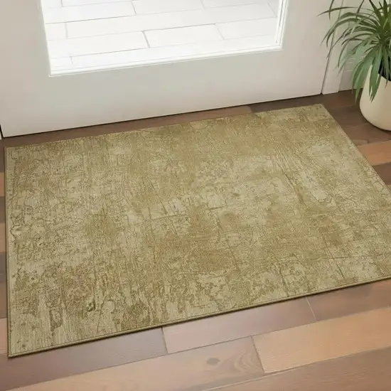 Beige And Ivory Abstract Washable Area Rug With UV Protection Photo 1