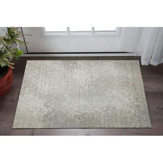 Beige And Ivory Abstract Washable Area Rug With UV Protection Photo 2