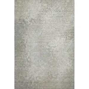 Photo of Beige And Ivory Abstract Washable Area Rug With UV Protection