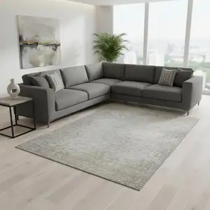 Photo of Beige And Ivory Abstract Washable Area Rug With UV Protection