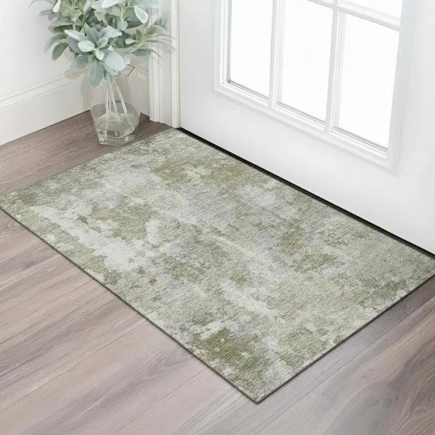 Beige And Ivory Abstract Washable Area Rug With UV Protection Photo 1