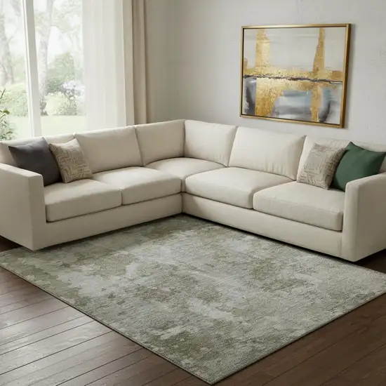 Beige And Ivory Abstract Washable Area Rug With UV Protection Photo 1