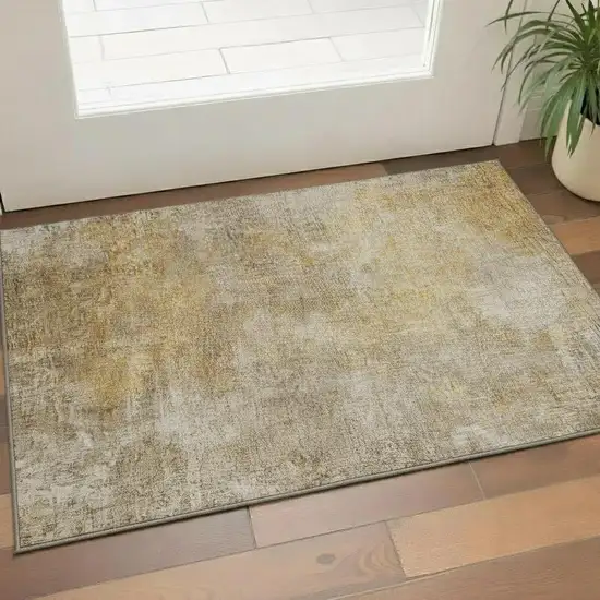Beige And Ivory Abstract Washable Area Rug With UV Protection Photo 1