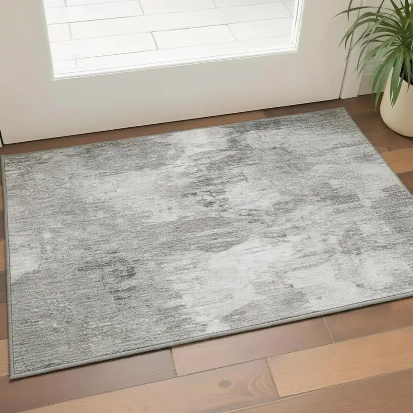 Beige And Ivory Abstract Washable Area Rug With UV Protection Photo 1