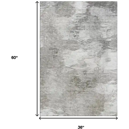 Beige And Ivory Abstract Washable Area Rug With UV Protection Photo 3