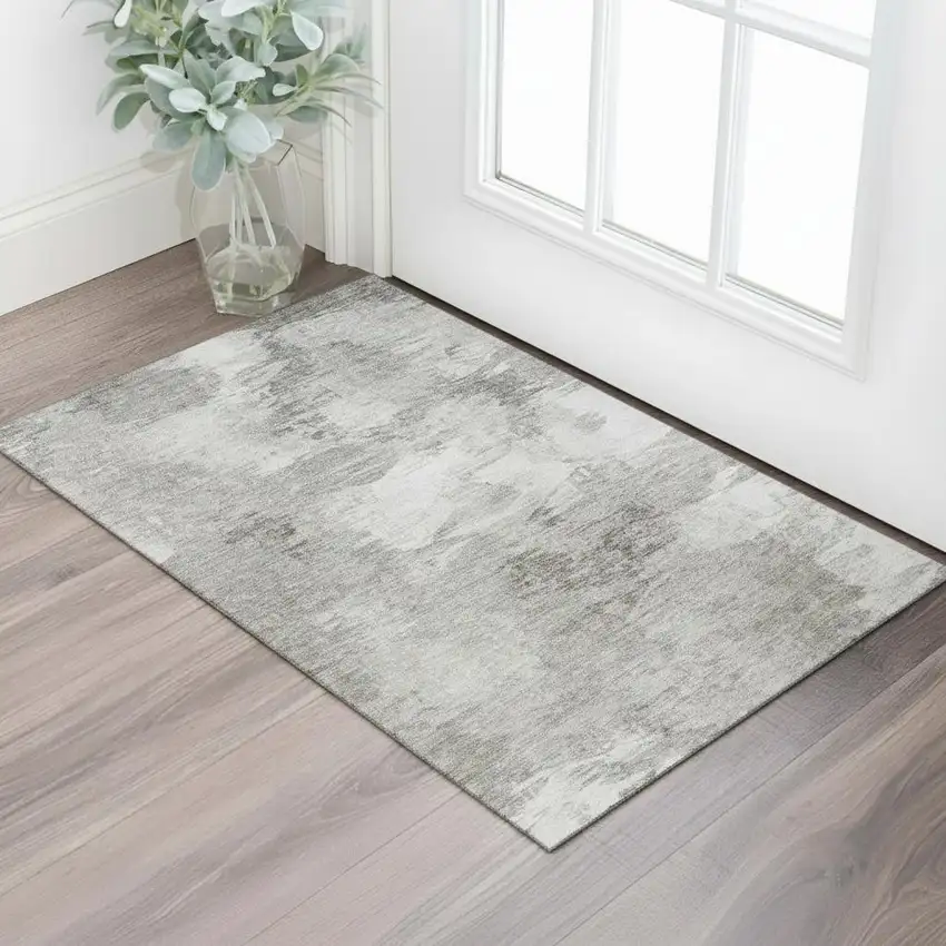 Beige And Ivory Abstract Washable Area Rug With UV Protection Photo 1