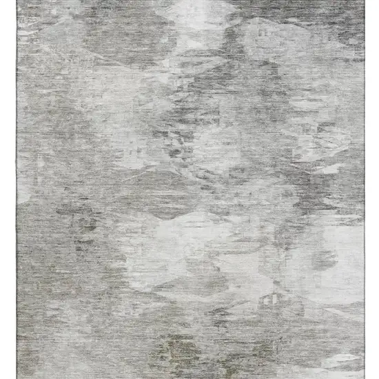 Beige And Ivory Abstract Washable Area Rug With UV Protection Photo 4