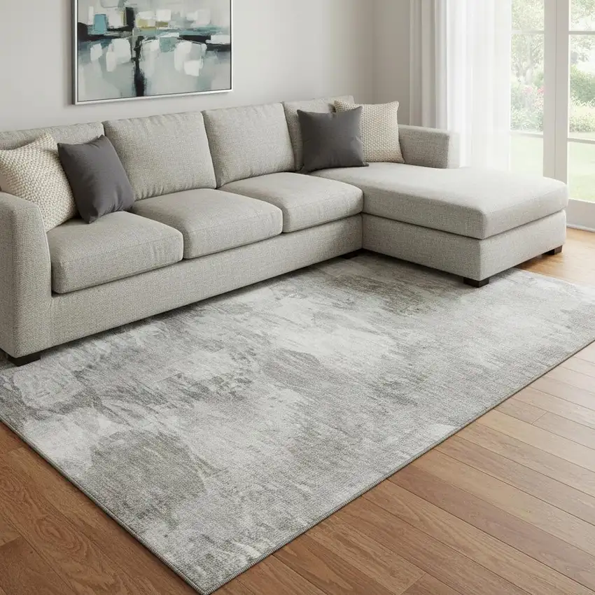 Beige And Ivory Abstract Washable Area Rug With UV Protection Photo 1