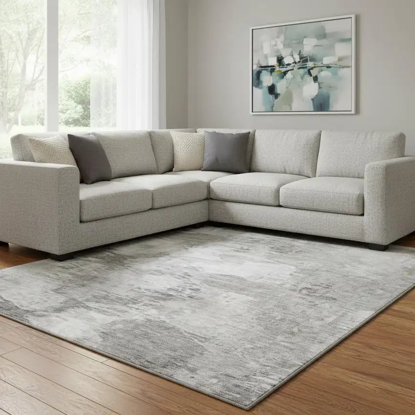 Beige And Ivory Abstract Washable Area Rug With UV Protection Photo 1