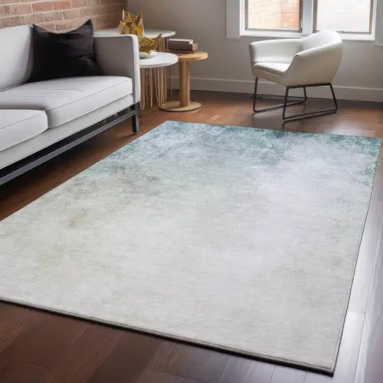 Beige And Ivory Abstract Washable Area Rug With UV Protection Photo 6
