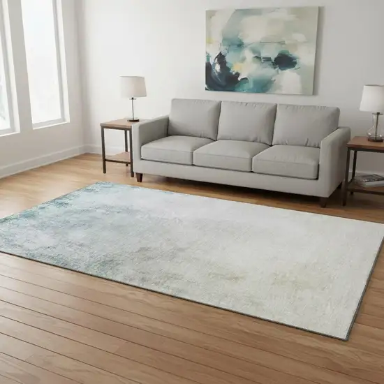 Beige And Ivory Abstract Washable Area Rug With UV Protection Photo 2