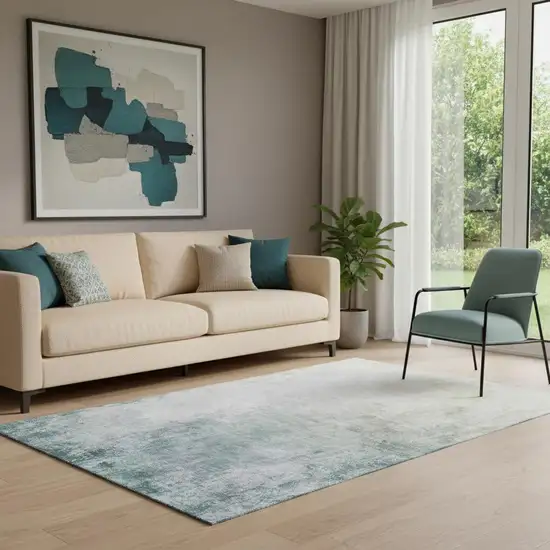 Beige And Ivory Abstract Washable Area Rug With UV Protection Photo 1