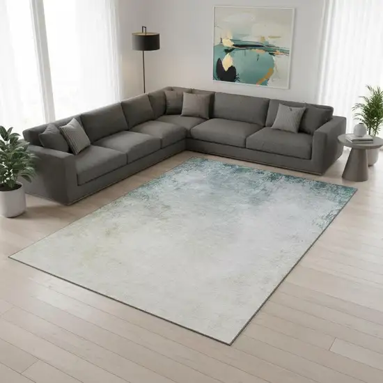 Beige And Ivory Abstract Washable Area Rug With UV Protection Photo 2