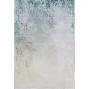 Photo of Beige And Ivory Abstract Washable Area Rug With UV Protection