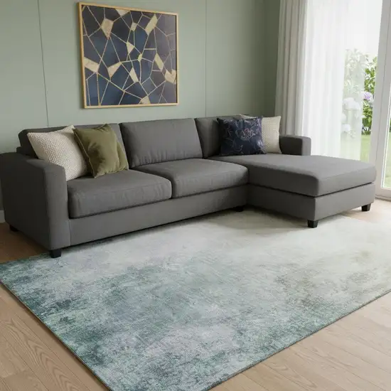 Beige And Ivory Abstract Washable Area Rug With UV Protection Photo 1