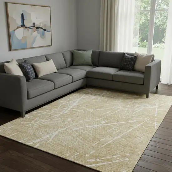 Beige And Ivory Abstract Washable Area Rug With UV Protection Photo 1