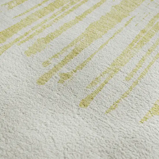 Beige And Ivory Abstract Washable Area Rug With UV Protection Photo 2