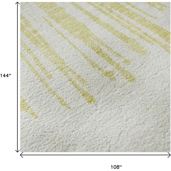 Beige And Ivory Abstract Washable Area Rug With UV Protection Photo 9