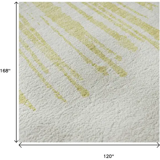 Beige And Ivory Abstract Washable Area Rug With UV Protection Photo 9