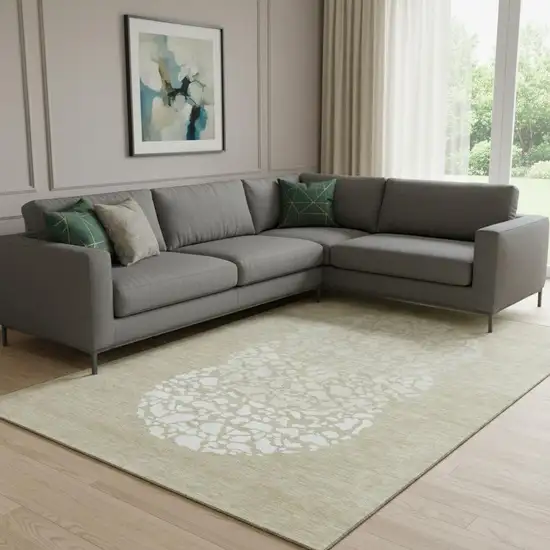 Beige And Ivory Abstract Washable Area Rug With UV Protection Photo 1