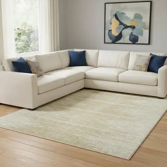 Beige And Ivory Abstract Washable Area Rug With UV Protection Photo 1