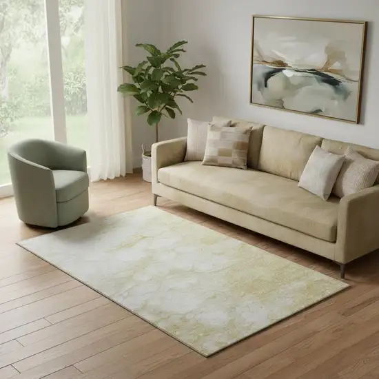 Beige And Ivory Abstract Washable Area Rug With UV Protection Photo 1