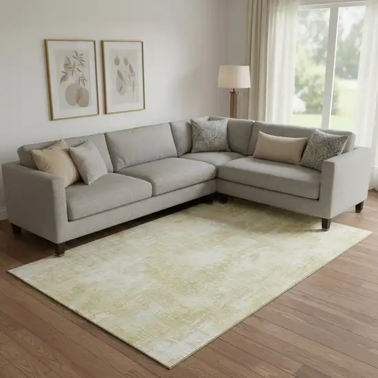 Beige And Ivory Abstract Washable Area Rug With UV Protection Photo 1