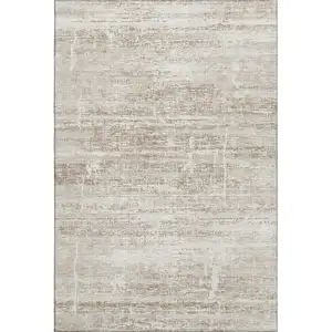 Photo of Beige And Ivory Abstract Washable Area Rug With UV Protection