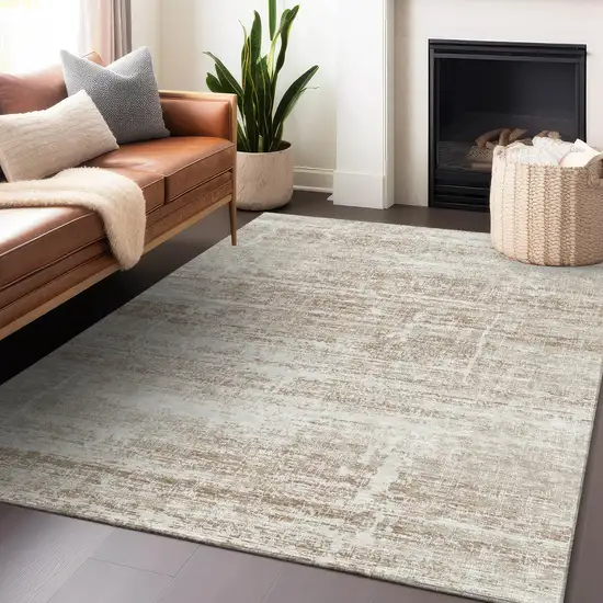 Beige And Ivory Abstract Washable Area Rug With UV Protection Photo 6