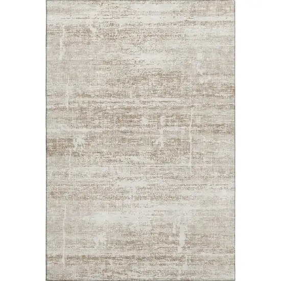 Beige And Ivory Abstract Washable Area Rug With UV Protection Photo 1