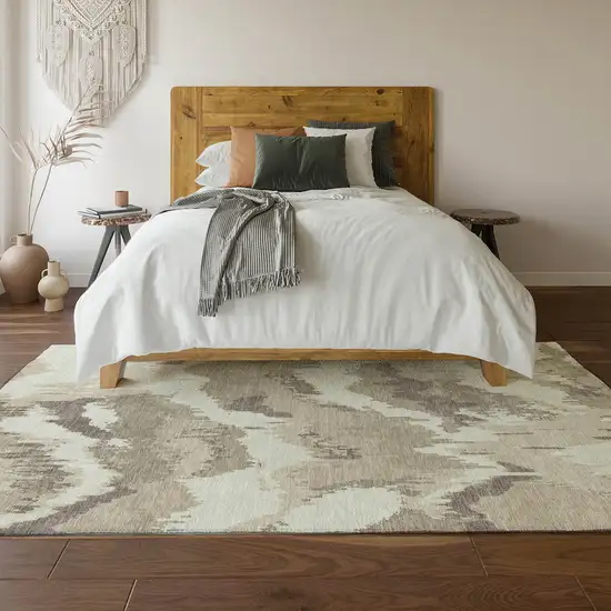 Beige And Ivory Abstract Washable Area Rug With UV Protection Photo 7