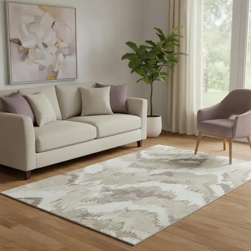 Beige And Ivory Abstract Washable Area Rug With UV Protection Photo 1